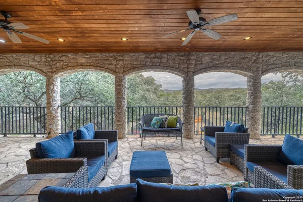 a view of living room filled with furniture and a table
