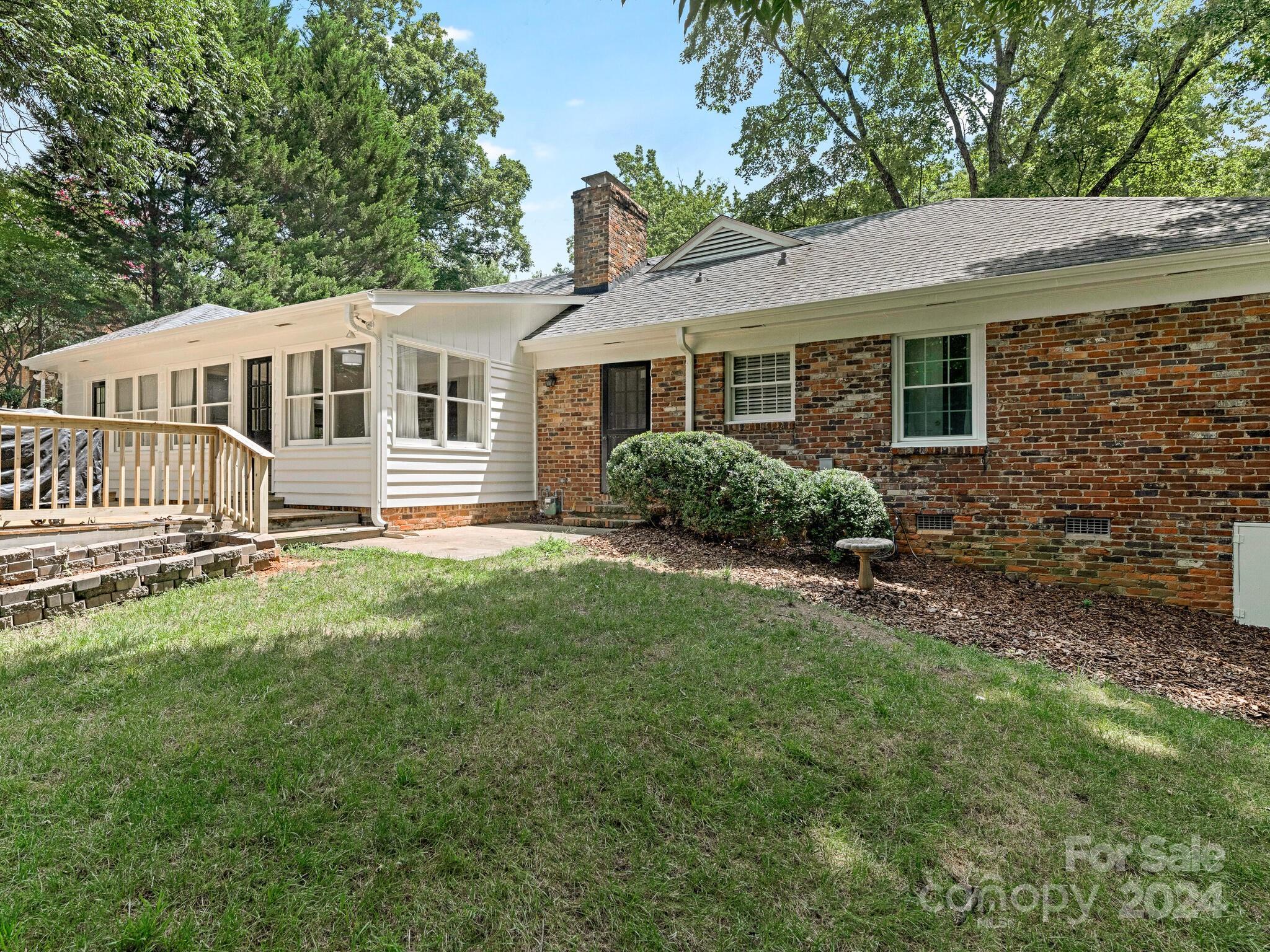 3912 Lovett Circle Charlotte, NC 28210 - Photo 25 of 25 a front view of a house with a garden
