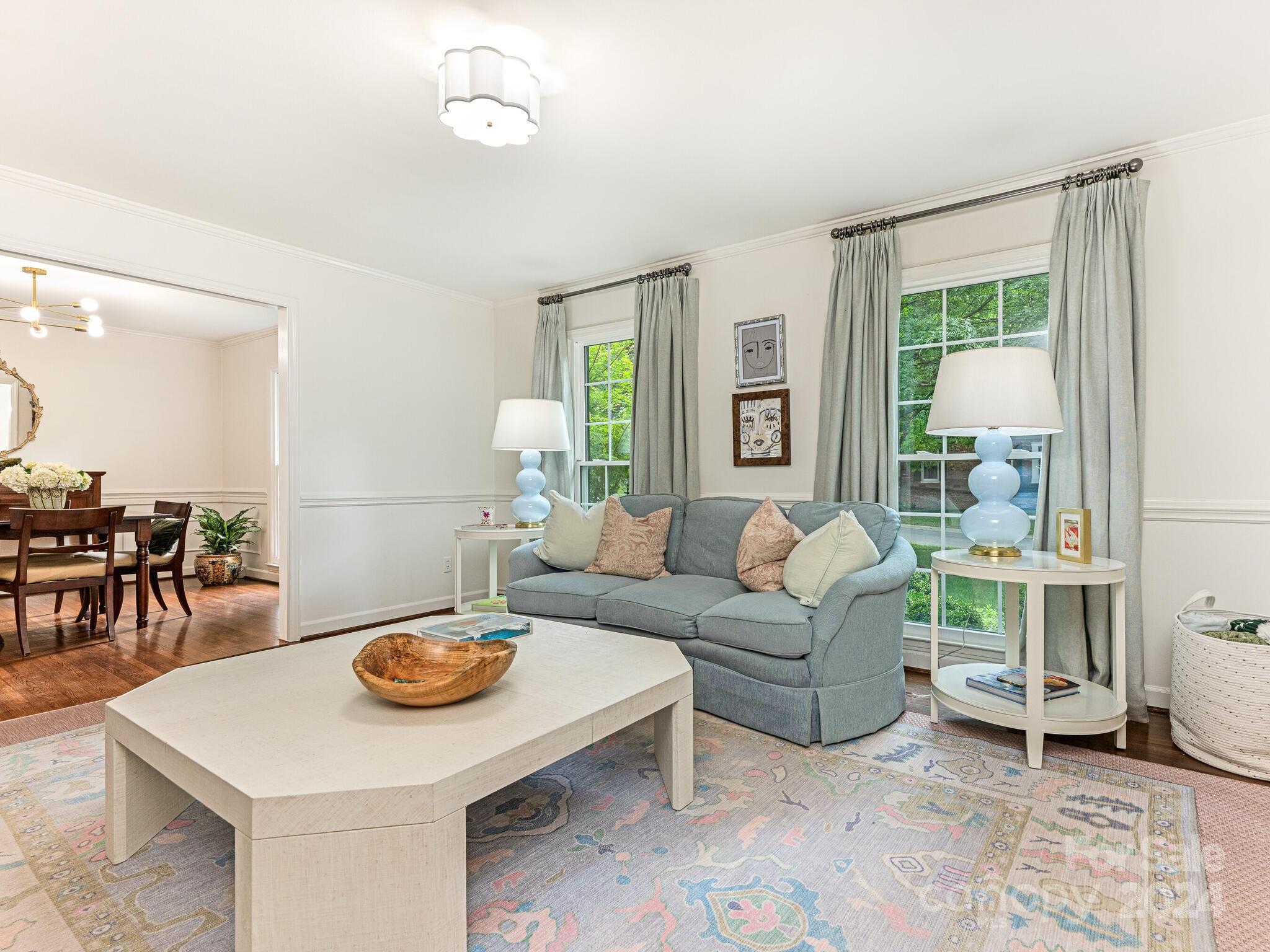3912 Lovett Circle Charlotte, NC 28210 - Photo 3 of 25 a living room with furniture and a table