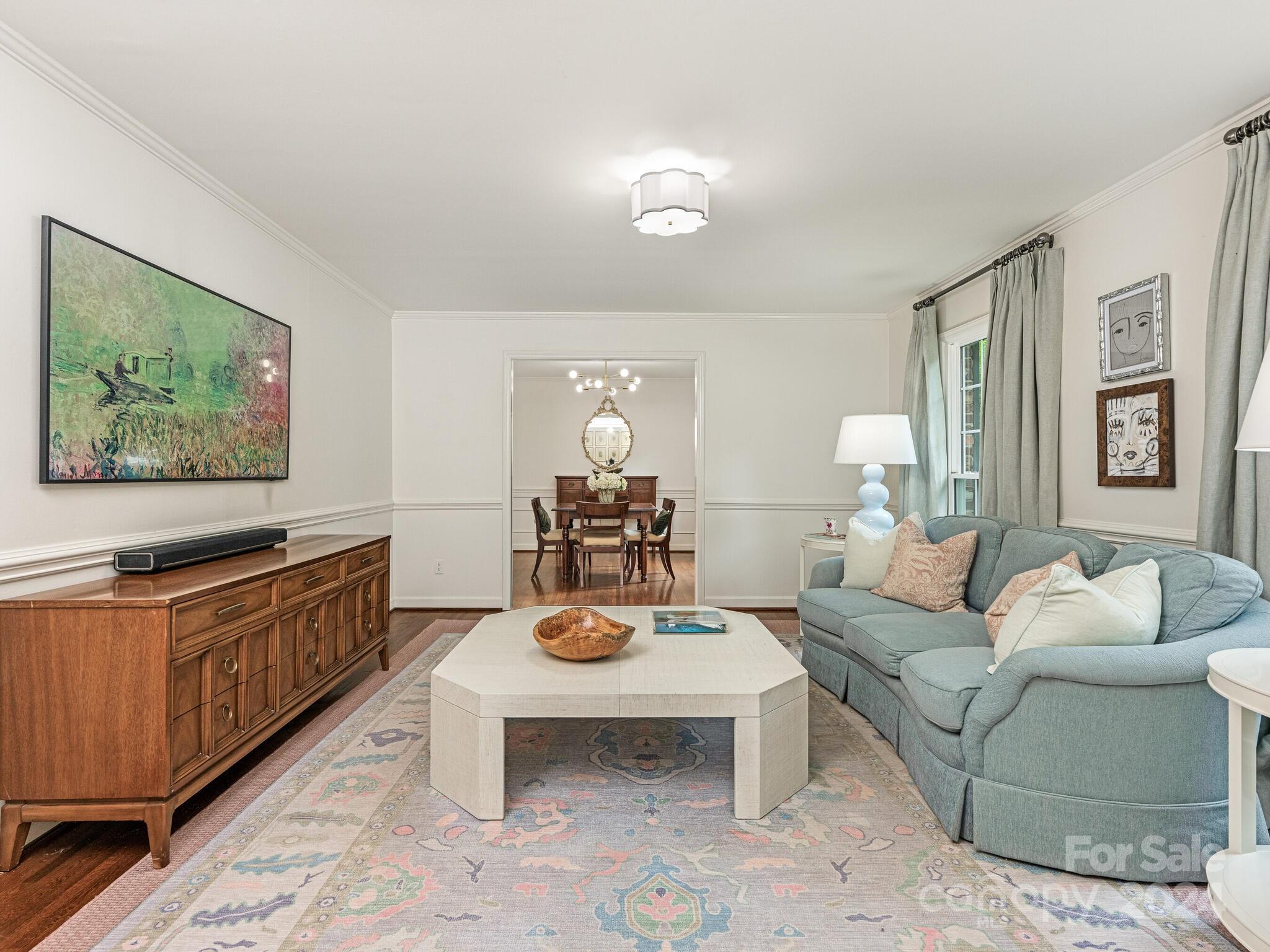 3912 Lovett Circle Charlotte, NC 28210 - Photo 4 of 25 a living room with furniture windows and a flat screen tv