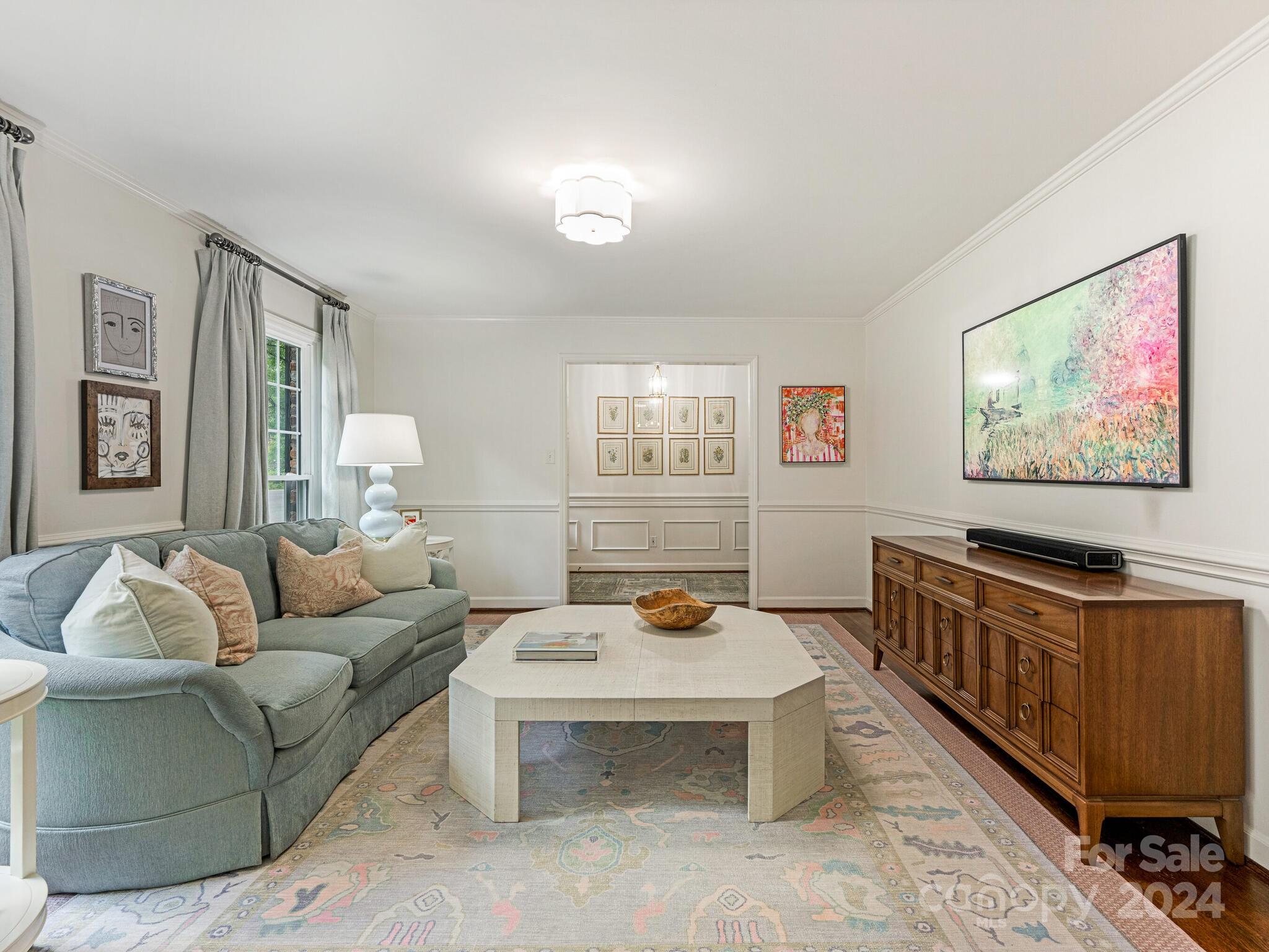 3912 Lovett Circle Charlotte, NC 28210 - Photo 5 of 25 a living room with furniture and a flat screen tv