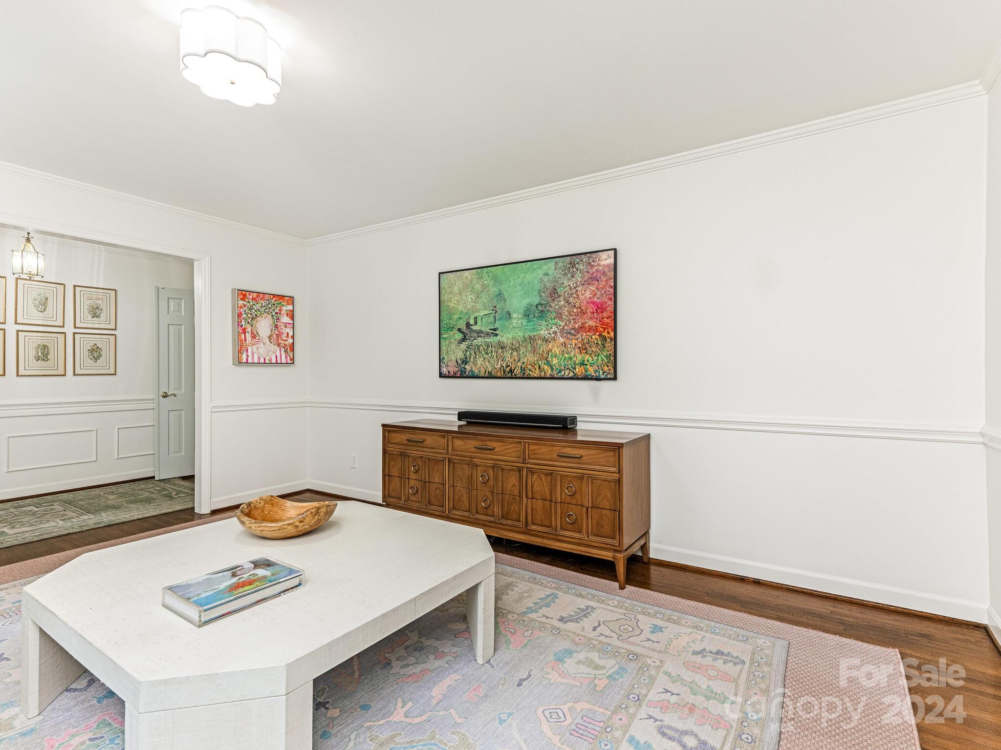 3912 Lovett Circle Charlotte, NC 28210 - Photo 6 of 25 a living room with furniture and a flat screen tv
