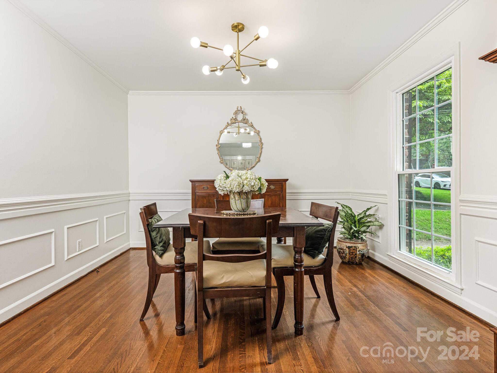 3912 Lovett Circle Charlotte, NC 28210 - Photo 7 of 25 a view of a dining room with furniture window and wooden floor