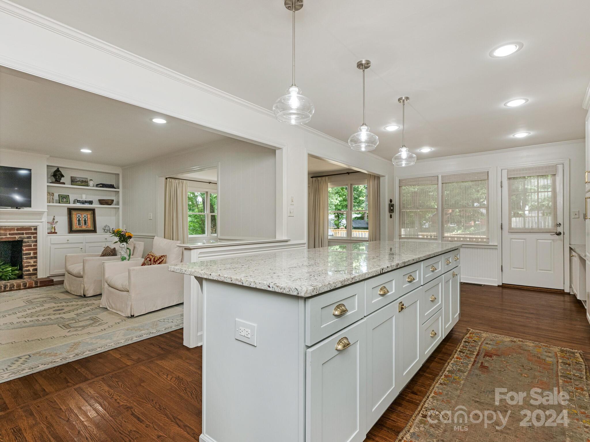 3912 Lovett Circle Charlotte, NC 28210 - Photo 9 of 25 a large kitchen with kitchen island a island in it