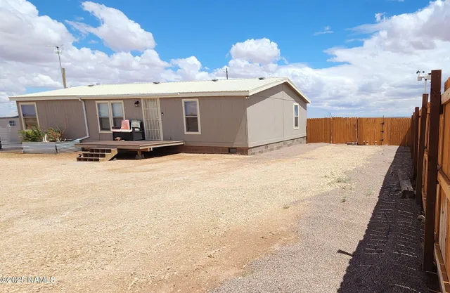 a view of house with outdoor space