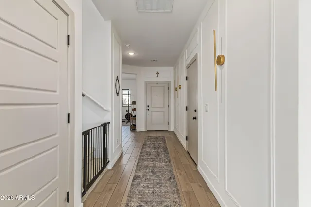 a picture of a bench in front of a wall