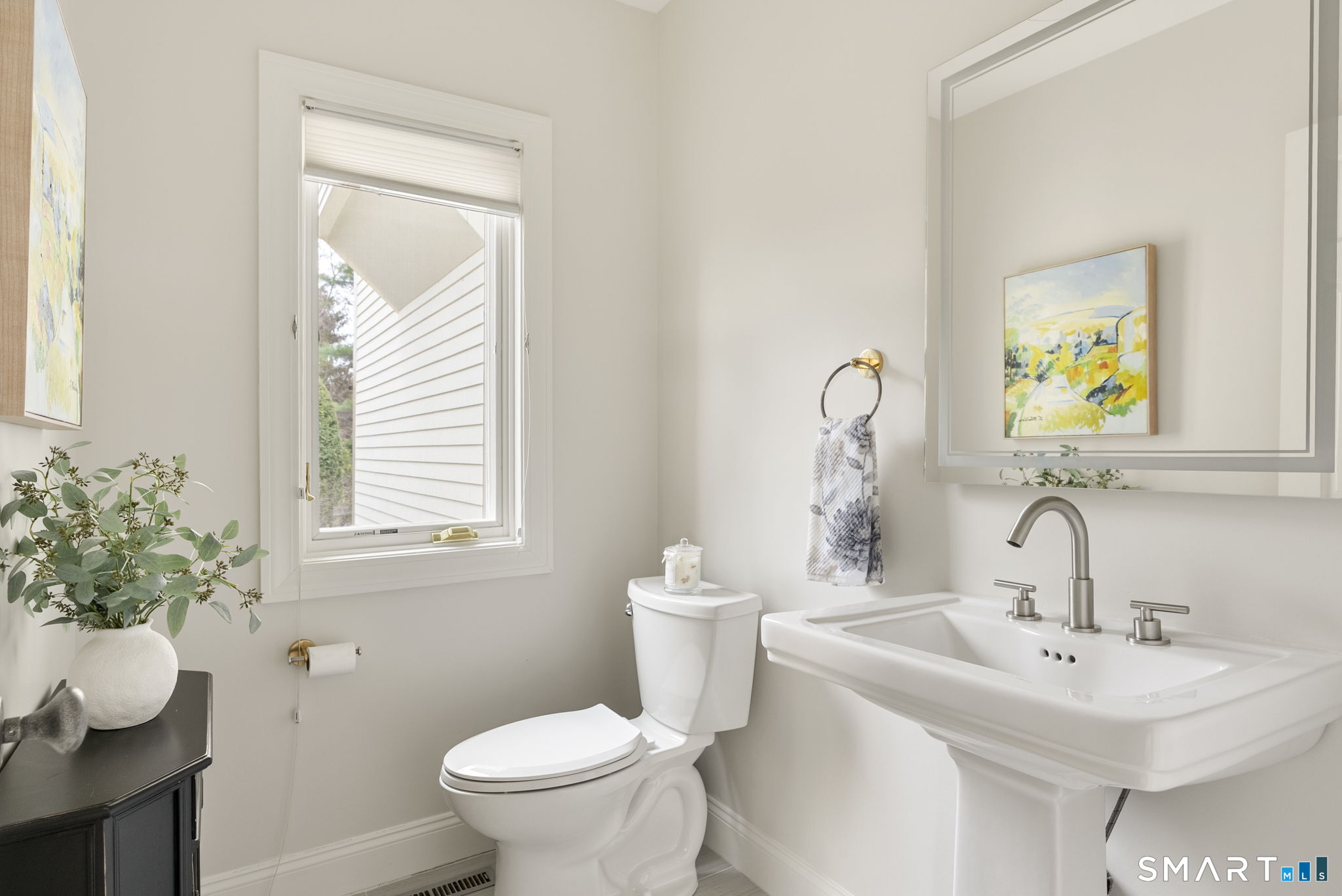 15 Cobtail Way Simsbury, CT 06070 - Photo 16 of 40 a bathroom with a toilet sink and mirror