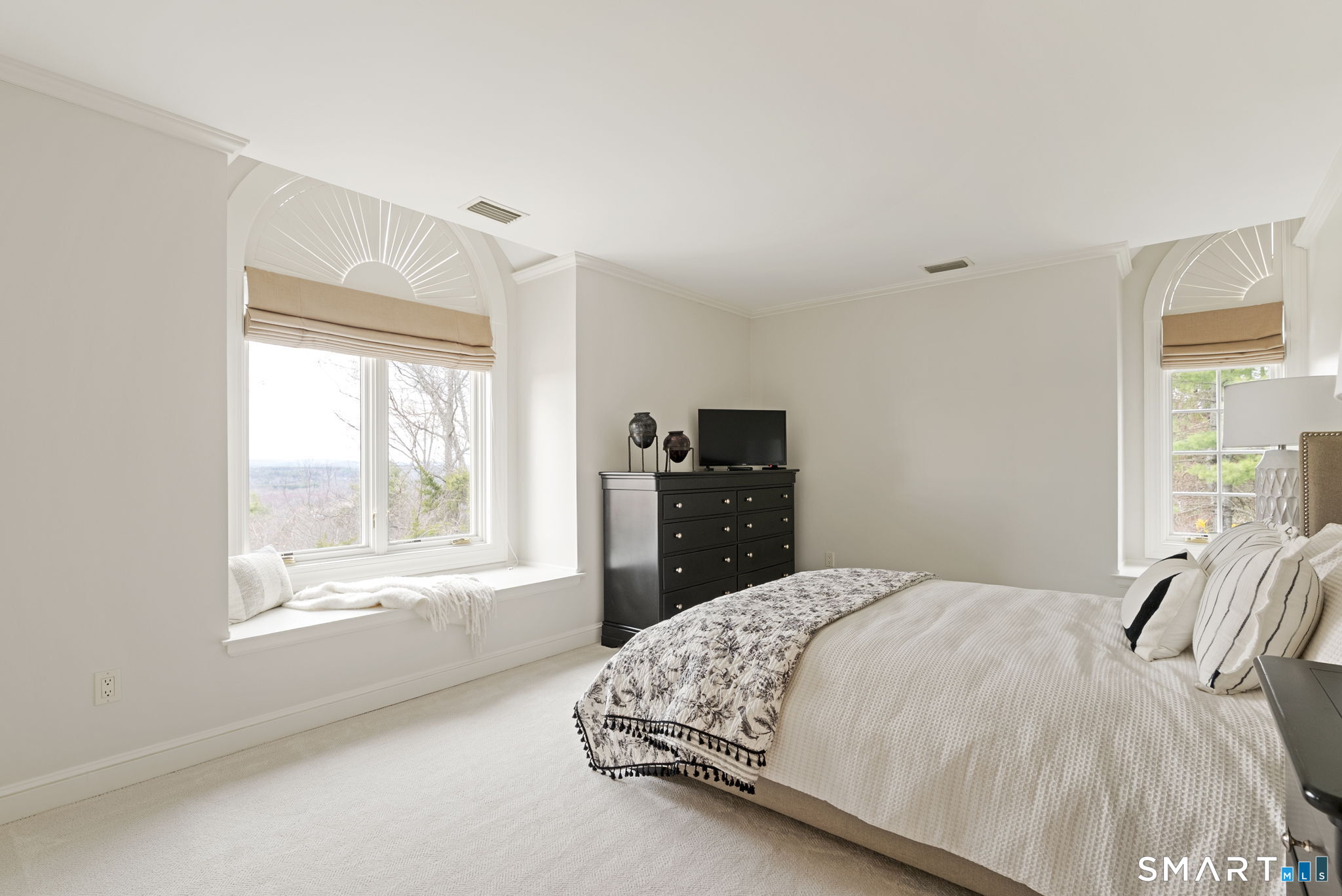 15 Cobtail Way Simsbury, CT 06070 - Photo 26 of 40 a bedroom with a large bed and a window
