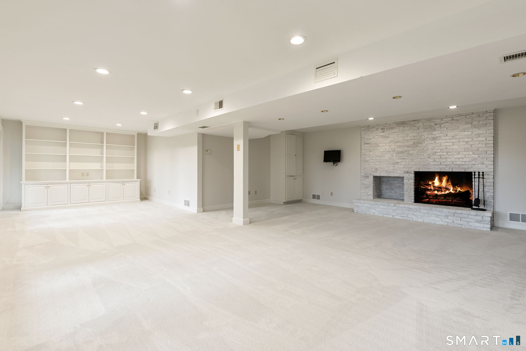 15 Cobtail Way Simsbury, CT 06070 - Photo 29 of 40 a view of an empty room with a fireplace