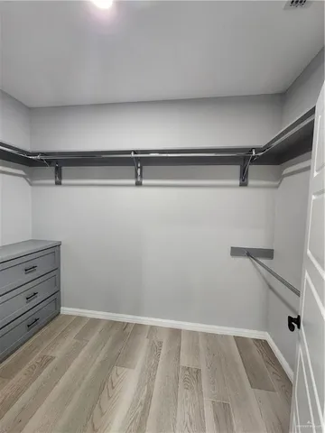 a view of a room with racks on the wall