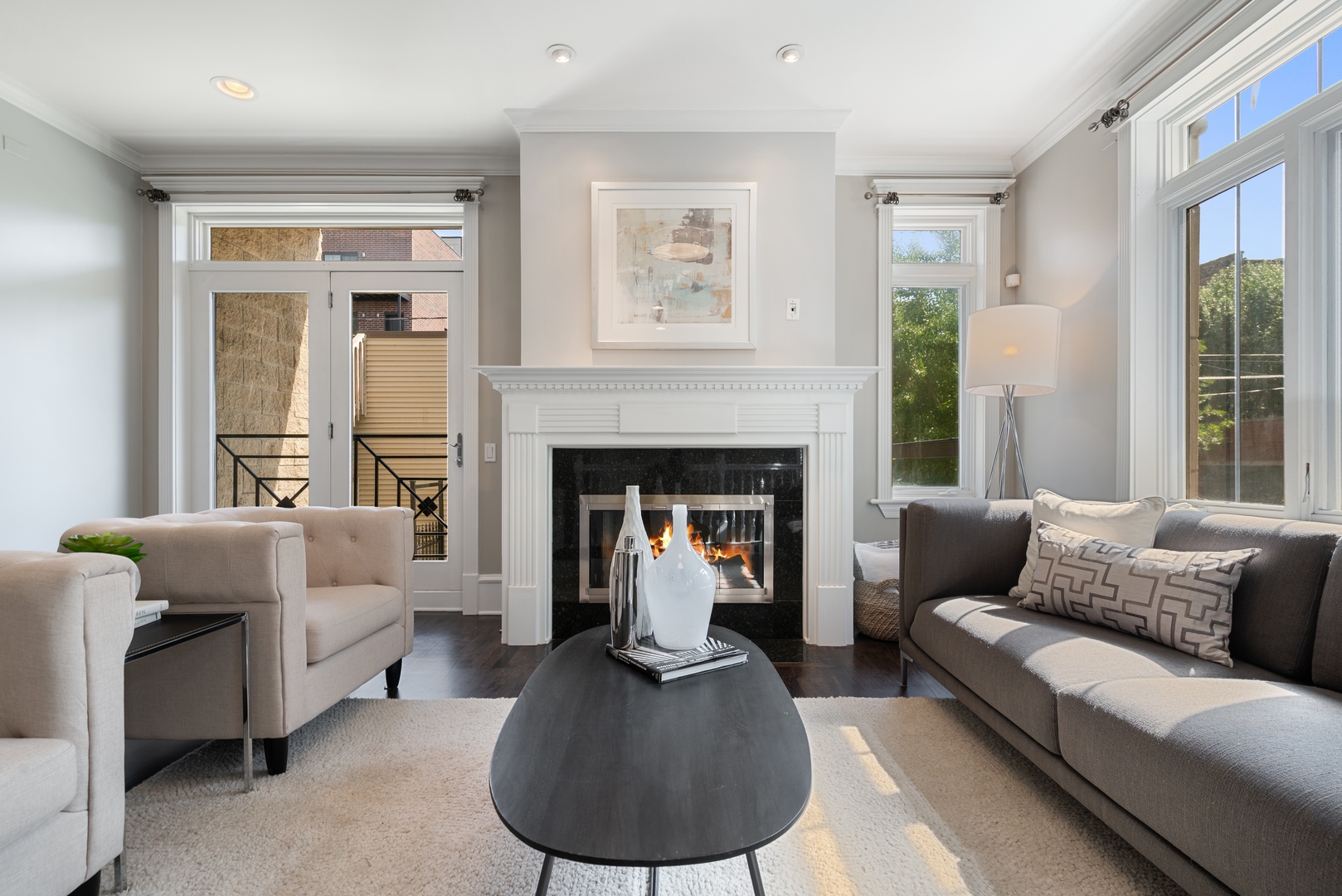 1503 North Mohawk Street, Unit 1E Chicago, IL 60610 - Photo 4 of 25 a living room with furniture and a fireplace