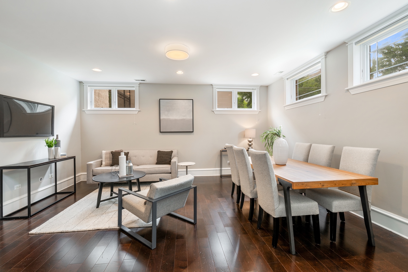 1503 North Mohawk Street, Unit 1E Chicago, IL 60610 - Photo 8 of 25 a view of a dining room with furniture and wooden floor