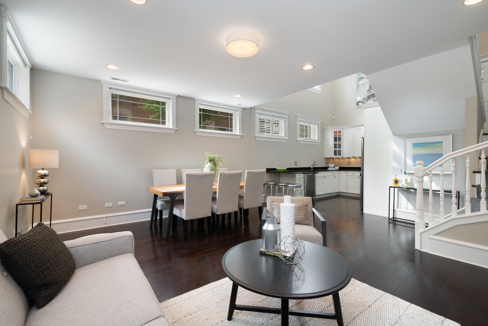 1503 North Mohawk Street, Unit 1E Chicago, IL 60610 - Photo 9 of 25 a living room with furniture a table and kitchen view