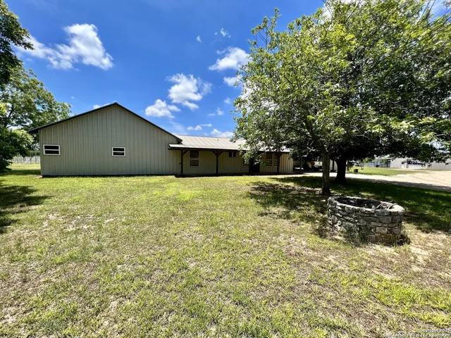 a house view with a garden space