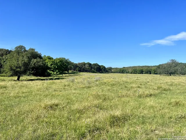 a view of lake with mountain in the background