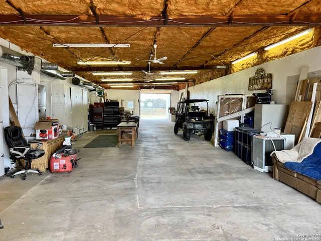 a view of a garage with storage