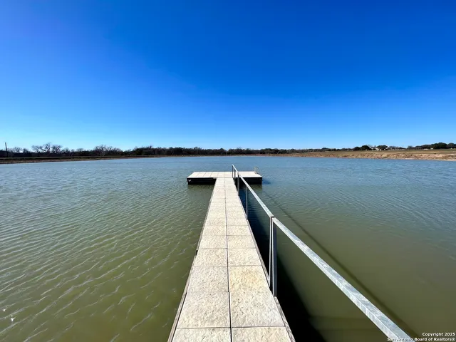 a view of outside space with a lake view