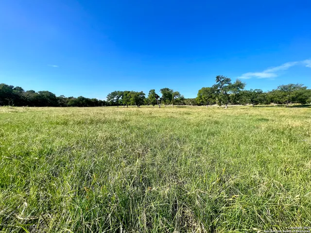 a view of an ocean and a mountain