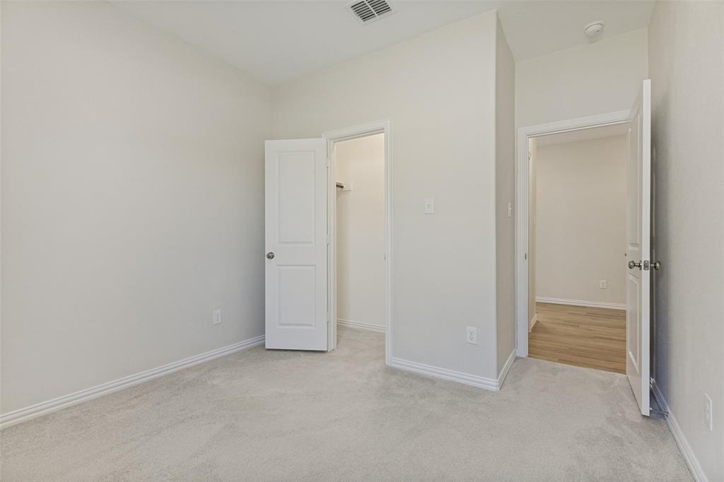 1237 Almond Road Azle, TX 76020 - Photo 15 of 24 a view of an empty room