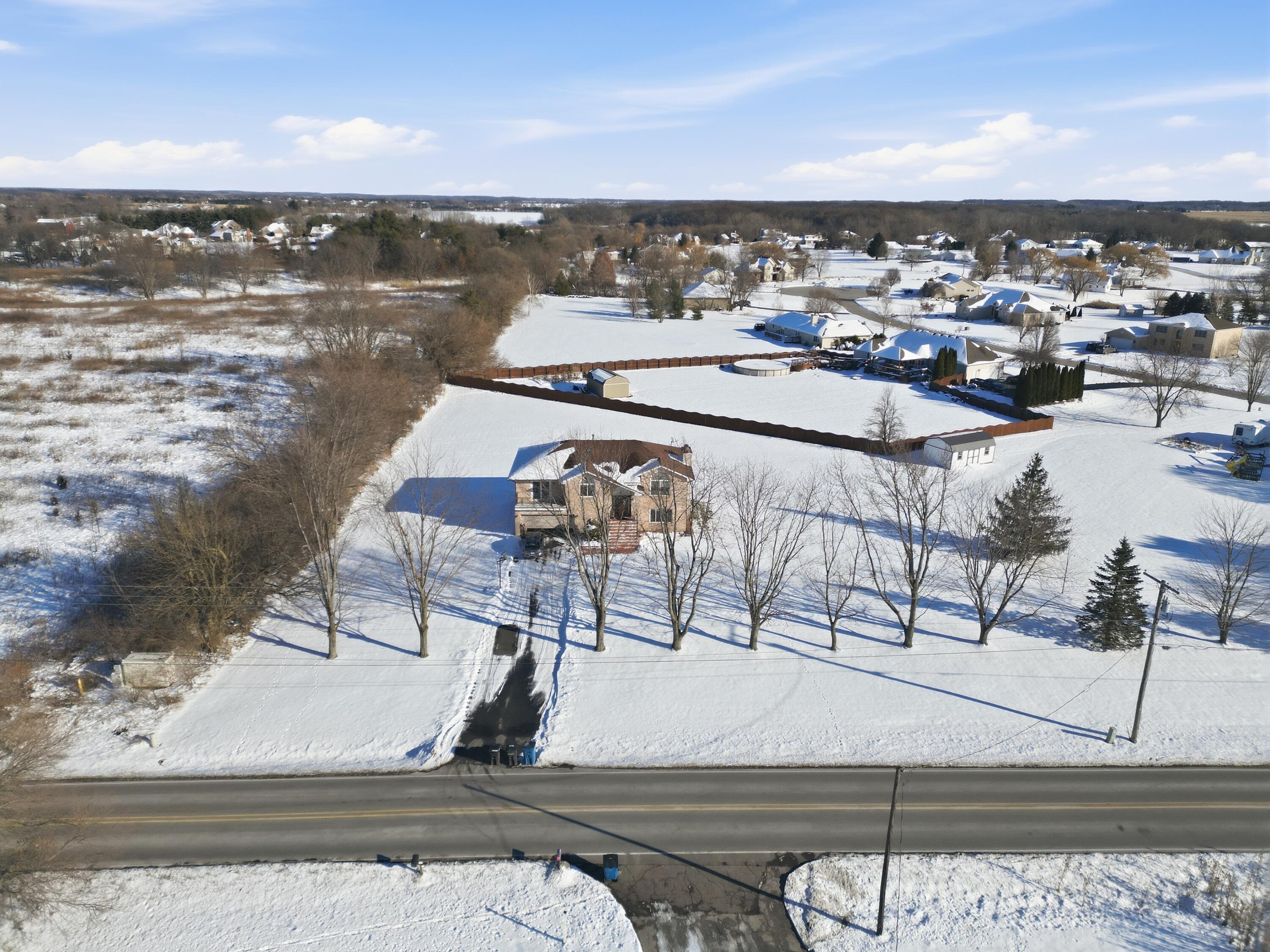 11109 Iowa Street Crown Point, IN 46307 - Photo 25 of 31 a view of a terrace with outdoor seating and city view