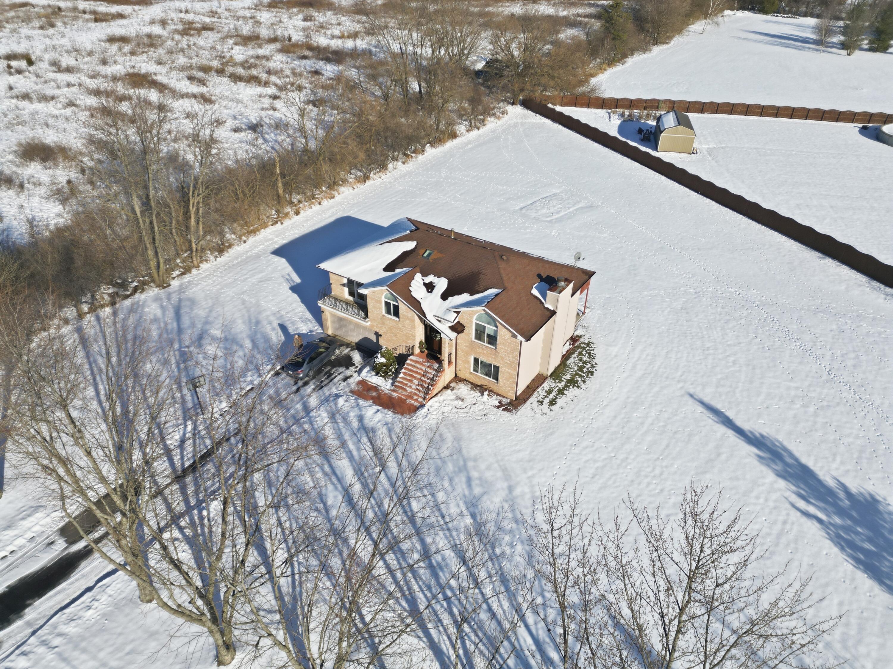 11109 Iowa Street Crown Point, IN 46307 - Photo 25 of 28 a view of a terrace with a snow