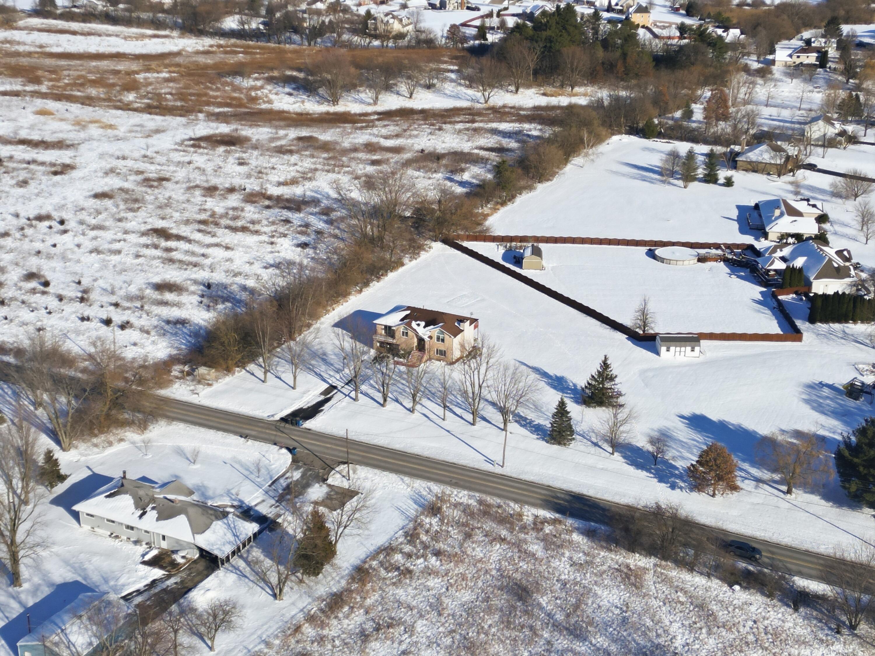 11109 Iowa Street Crown Point, IN 46307 - Photo 29 of 31 an aerial view of a house with lake view