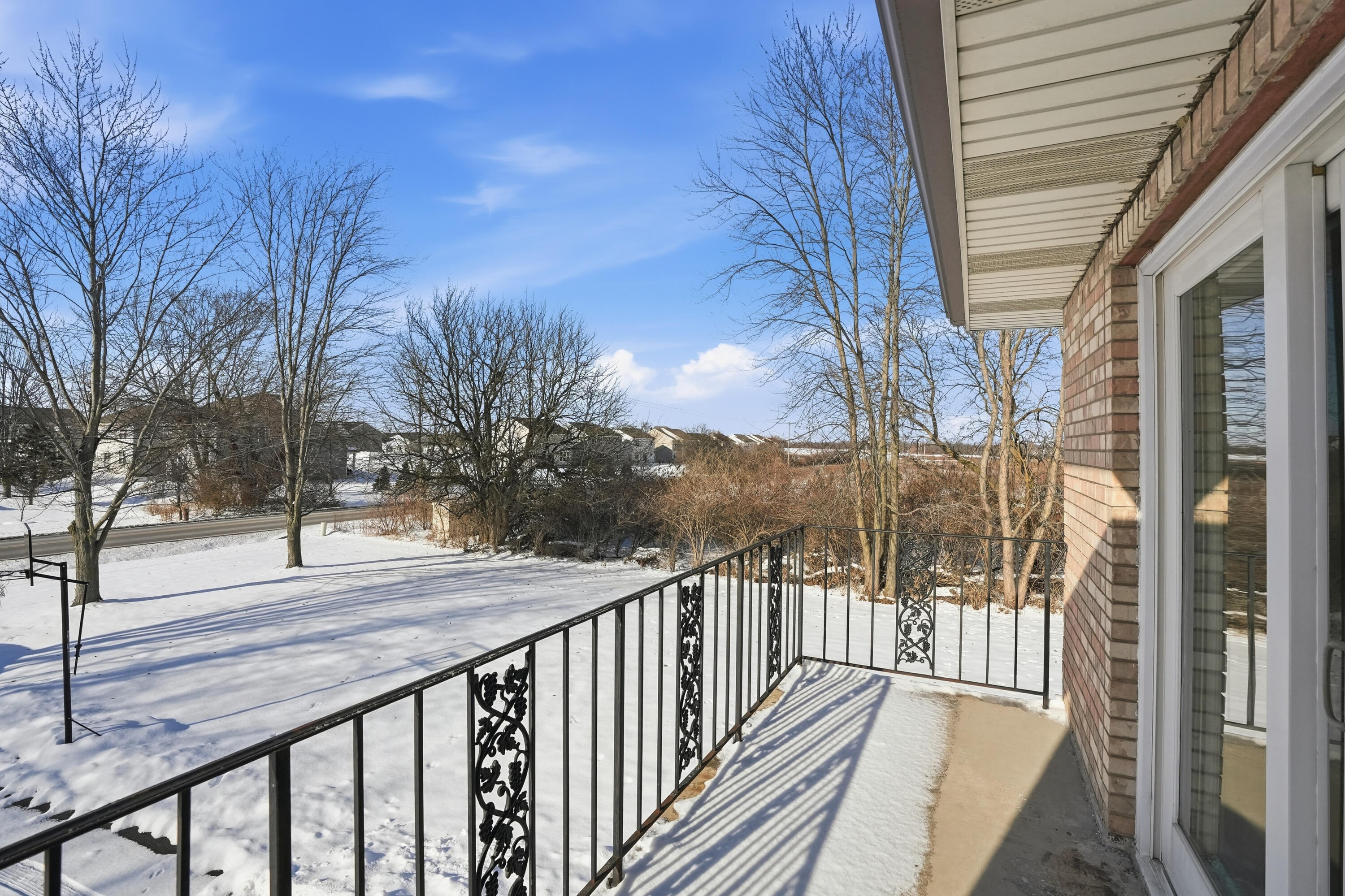11109 Iowa Street Crown Point, IN 46307 - Photo 30 of 31 a view of a balcony with wooden floor