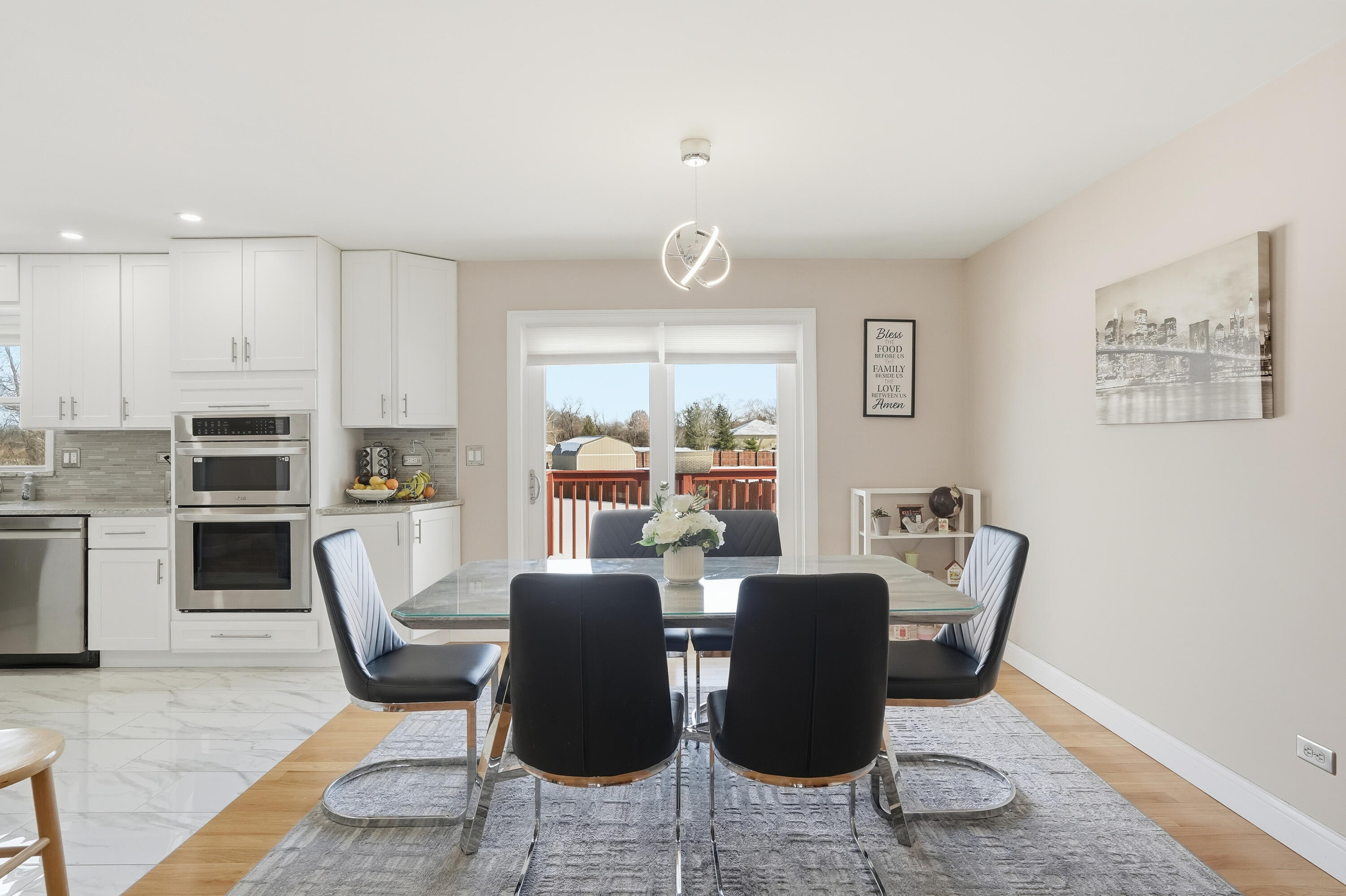 11109 Iowa Street Crown Point, IN 46307 - Photo 8 of 31 a view of a dining room with furniture window and wooden floor