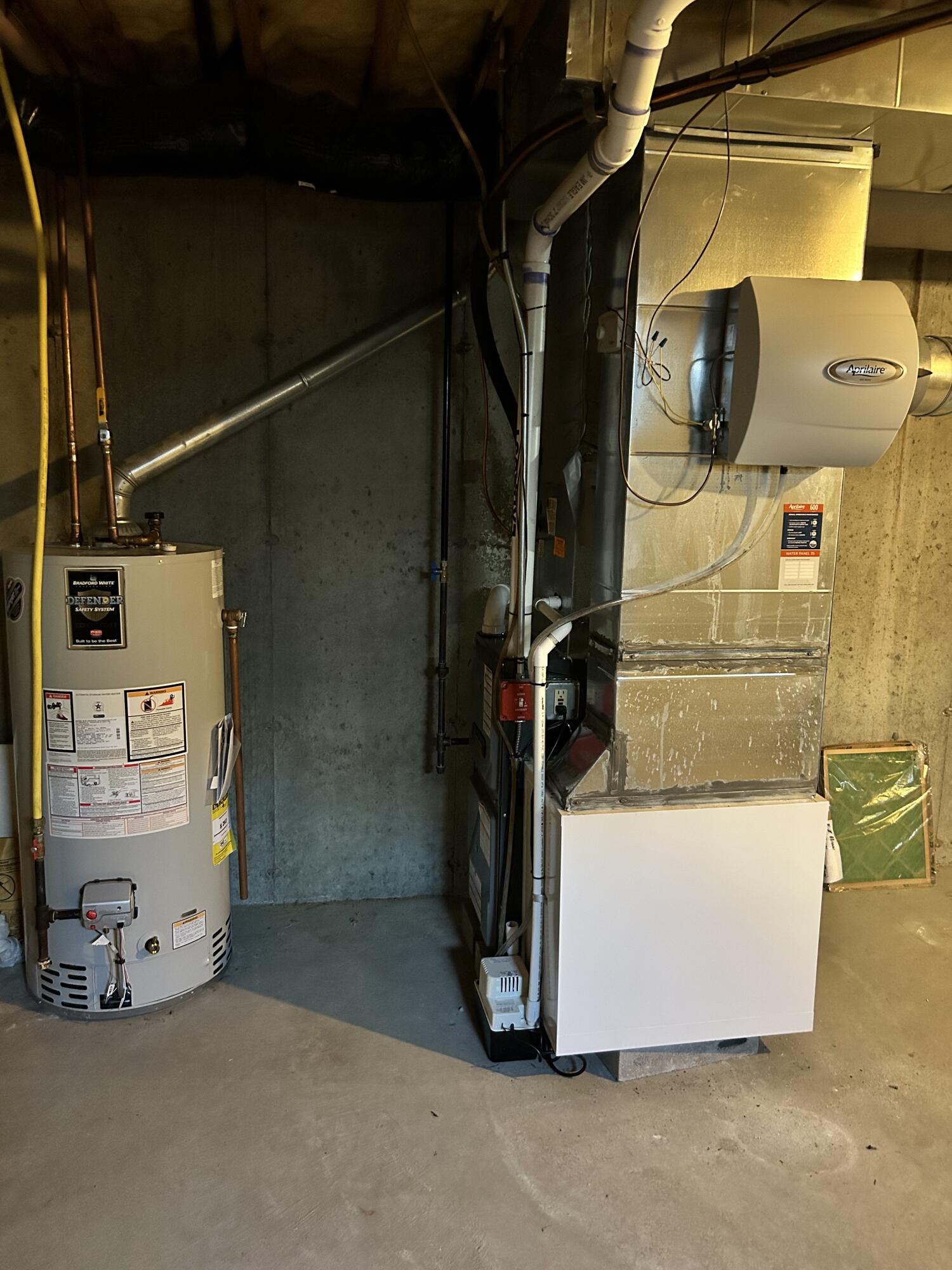 28 Windward Street, Unit 28 Mashpee, MA 02649 - Photo 18 of 37 a view of water heater room