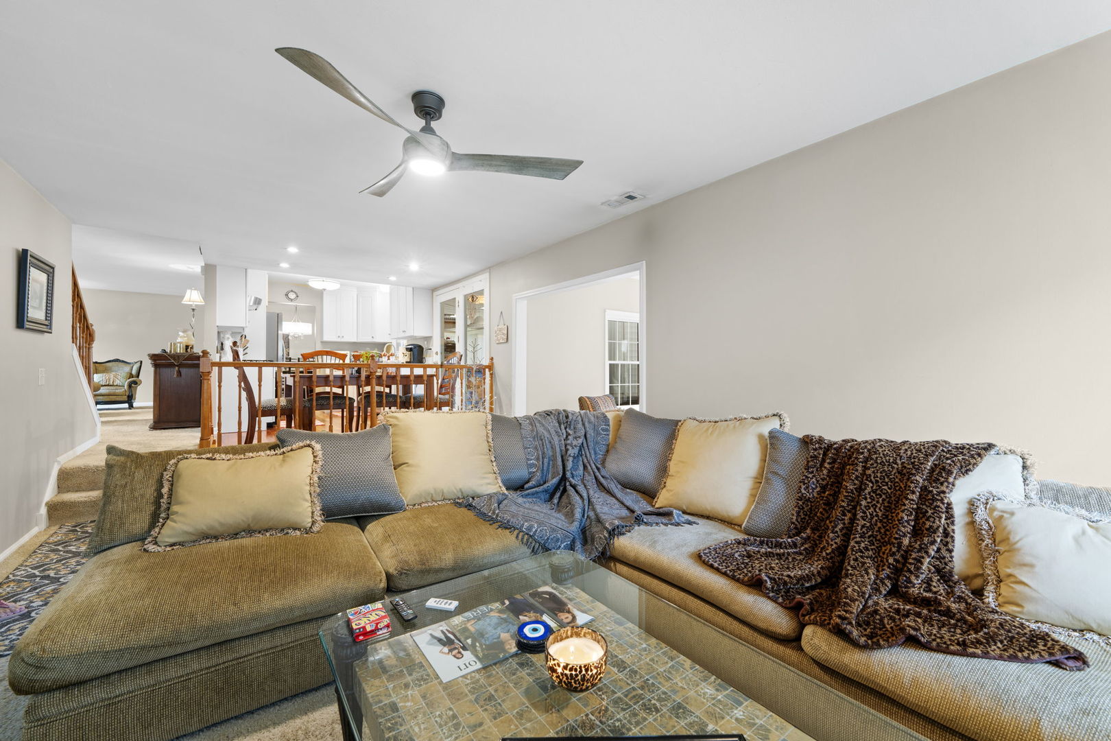 1085 John Drive Hoffman Estates, IL 60169 - Photo 15 of 41 a living room with furniture and kitchen view
