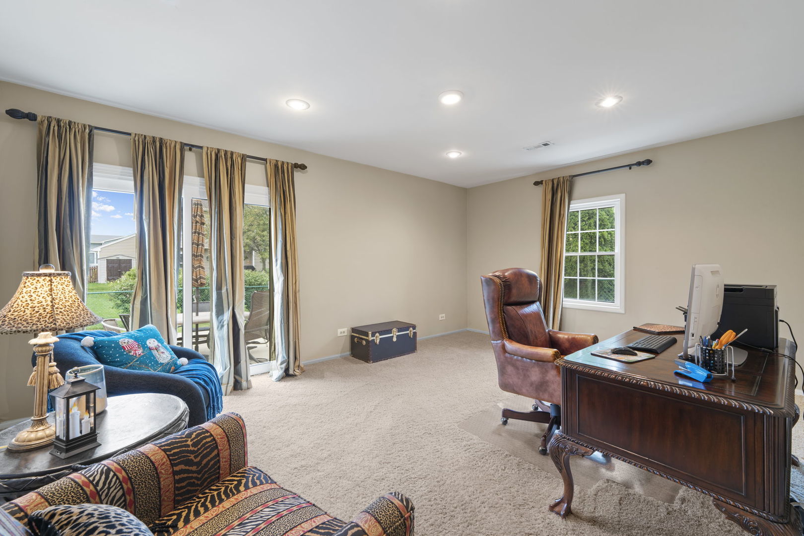 1085 John Drive Hoffman Estates, IL 60169 - Photo 17 of 41 a living room with furniture and a window