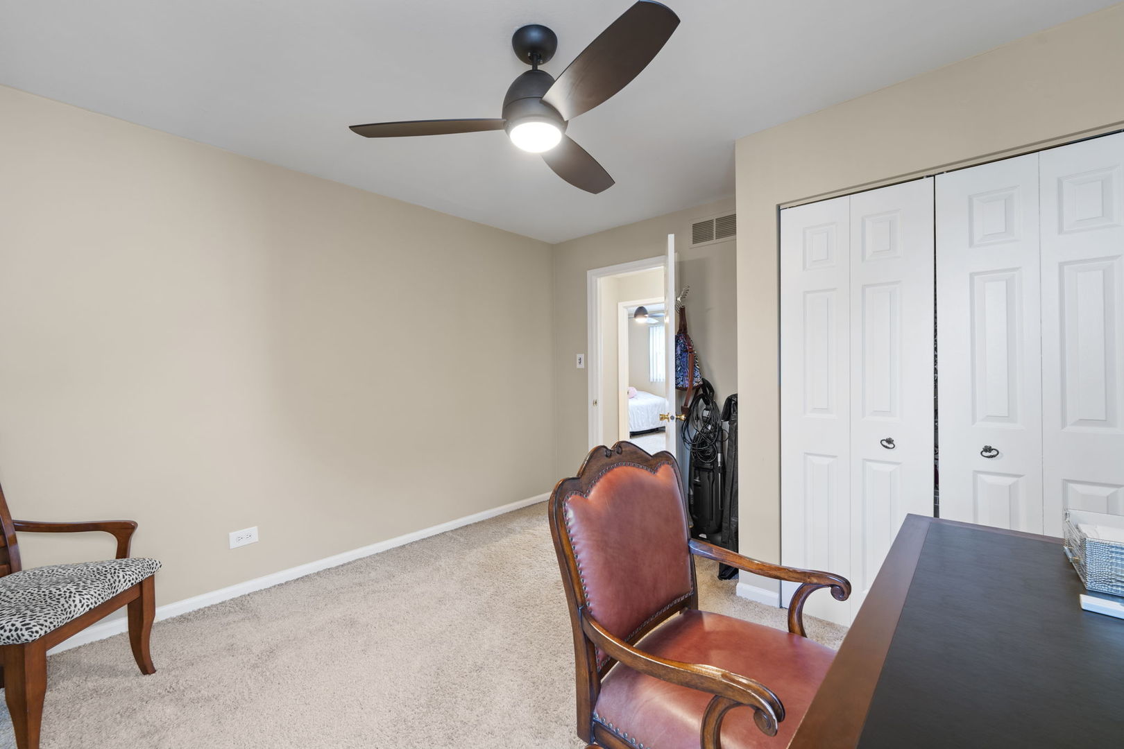 1085 John Drive Hoffman Estates, IL 60169 - Photo 20 of 41 a view of workspace and bedroom with furniture