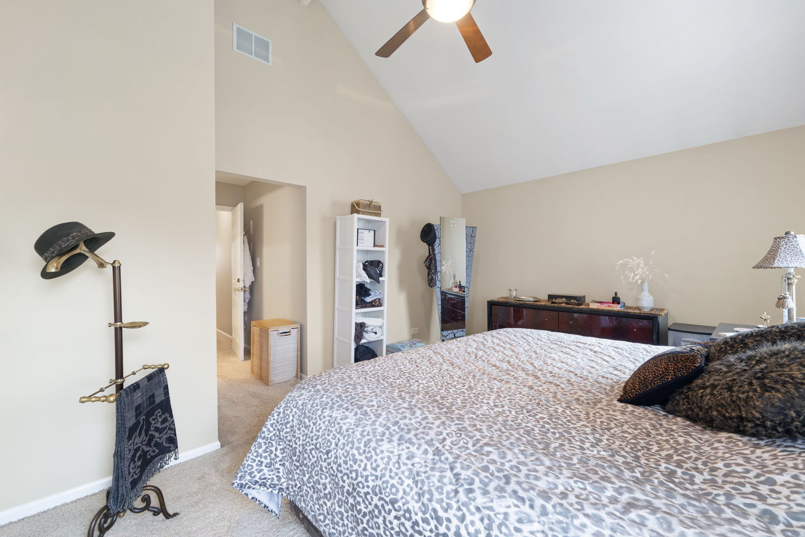 1085 John Drive Hoffman Estates, IL 60169 - Photo 23 of 41 a bedroom with a bed and a chandelier
