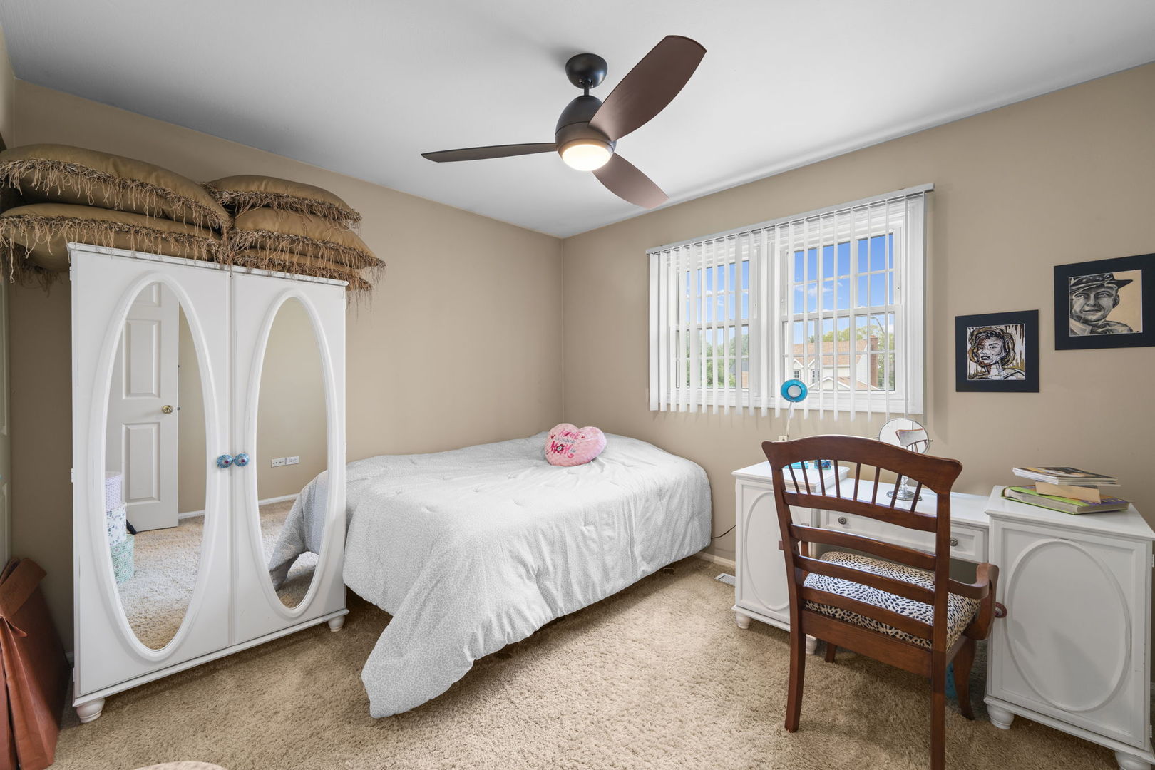 1085 John Drive Hoffman Estates, IL 60169 - Photo 26 of 41 a bedroom with a bed and a chandelier