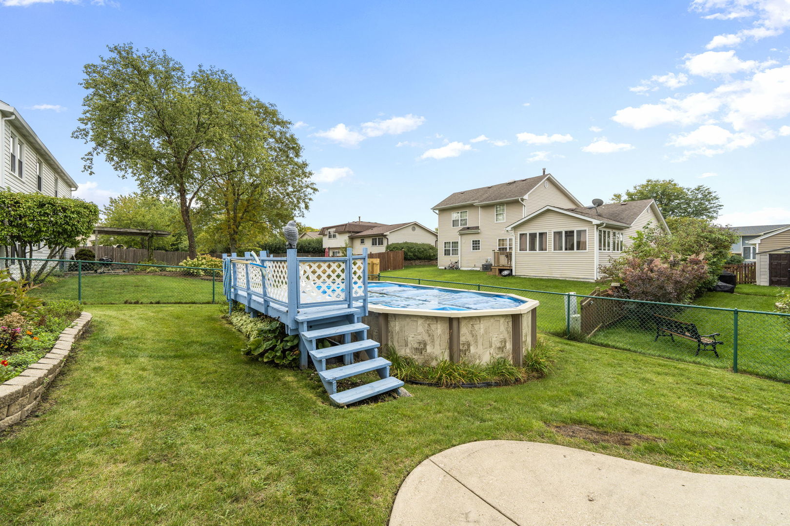 1085 John Drive Hoffman Estates, IL 60169 - Photo 35 of 41 a view of a house with a yard porch and sitting area