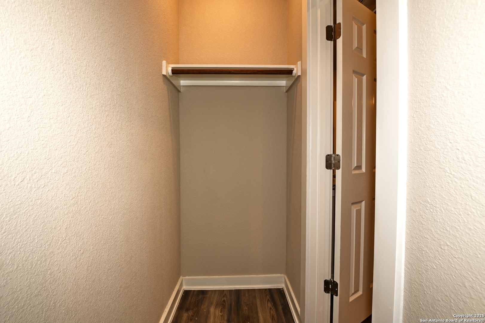 11318 Clearmine, Unit 101 San Antonio, TX 78224 - Photo 11 of 39 a view of walk in closet with empty racks
