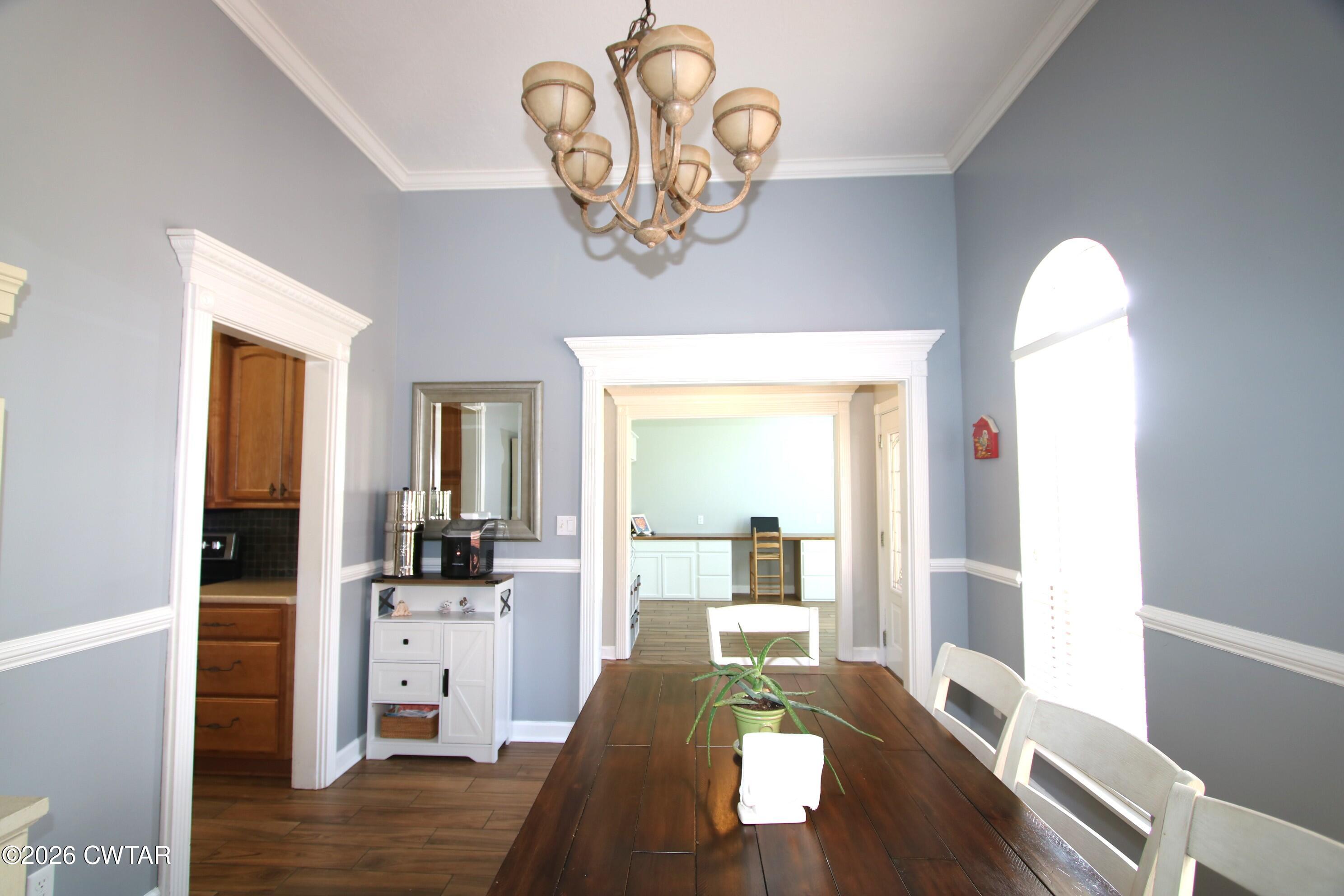 98 Browning Road Milan, TN 38358 - Photo 5 of 60 a view of a dining room with furniture window and wooden floor