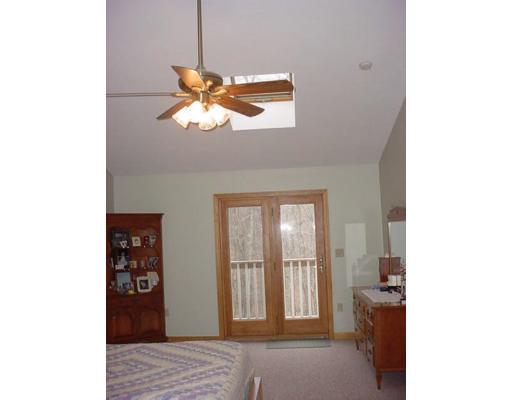 453 Keys Road Warren, MA 01585 - Photo 7 of 24 a view of a room with a hanging ceiling fan