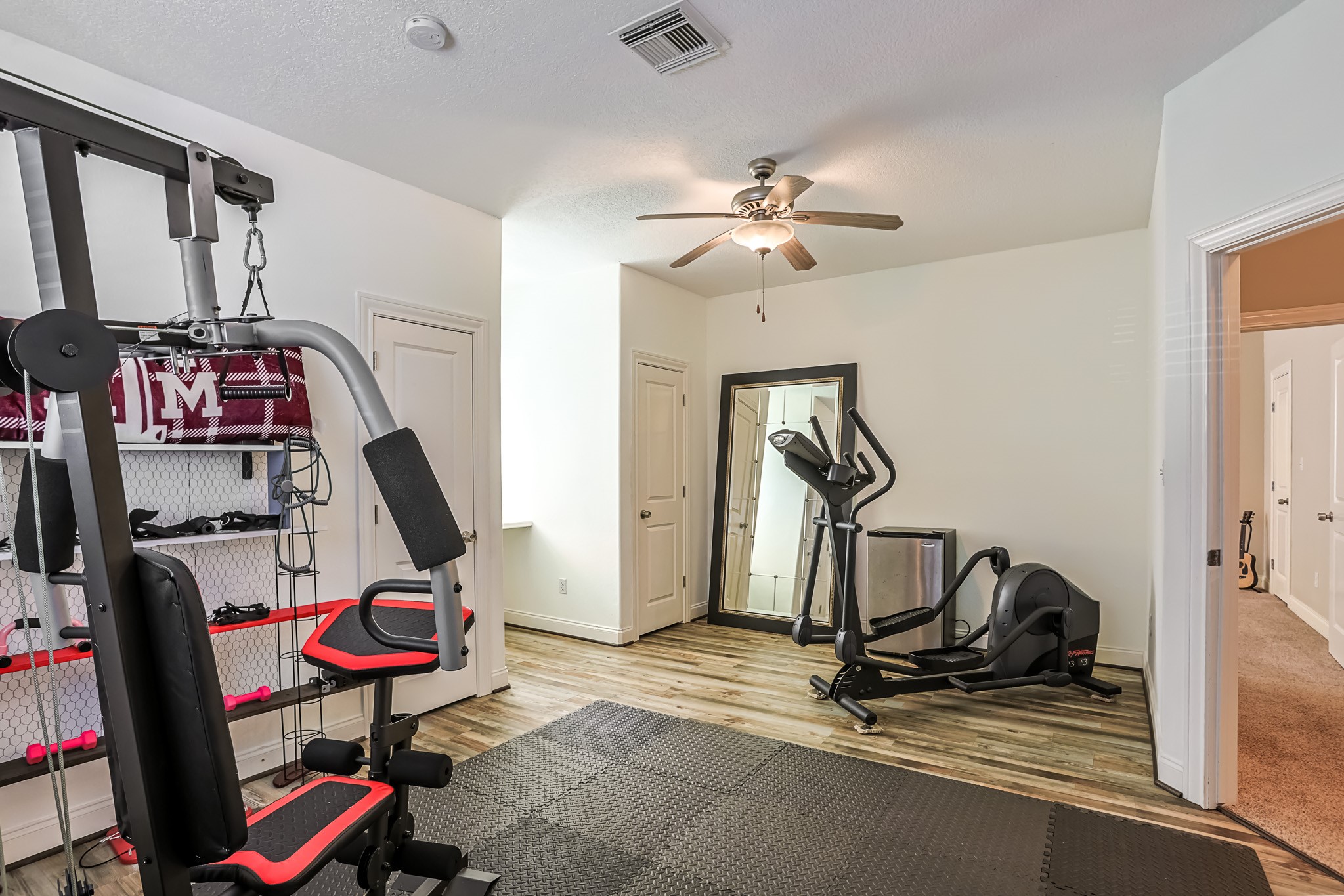30119 West Geneva Drive Spring, TX 77386 - Photo 37 of 49 Spacious flex room currently used as a home gym, complete with closet and easy access to upstairs amenities