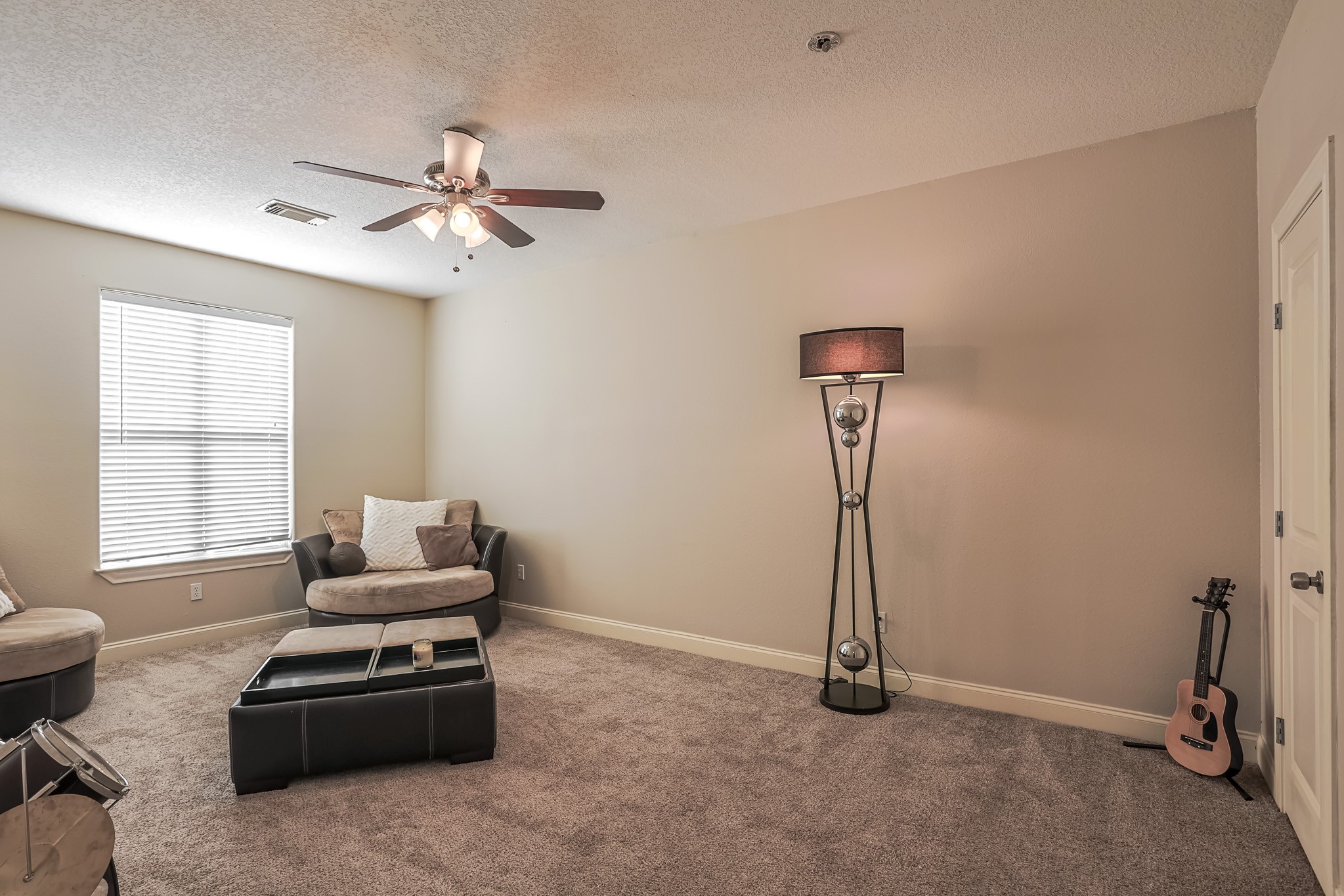 30119 West Geneva Drive Spring, TX 77386 - Photo 38 of 49 Inviting upstairs lounge offering the perfect space to unwind, play music, or enjoy quiet evenings with family.