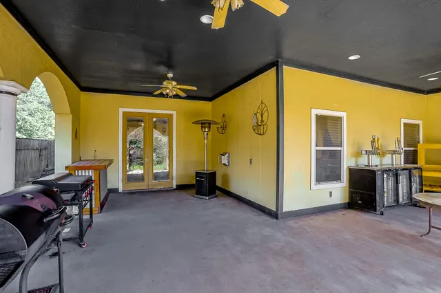 a view of a livingroom with furniture and windows
