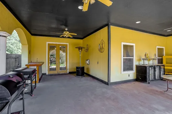 a view of a livingroom with furniture and windows
