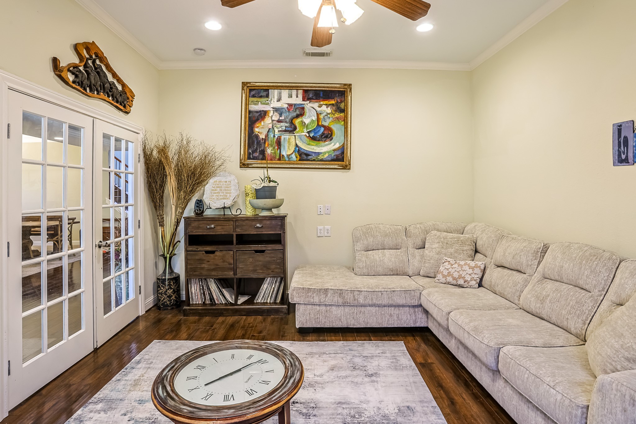 30119 West Geneva Drive Spring, TX 77386 - Photo 8 of 49 Versatile flex space framed by French doors and warm tones, perfect for entertaining or relaxing in style.