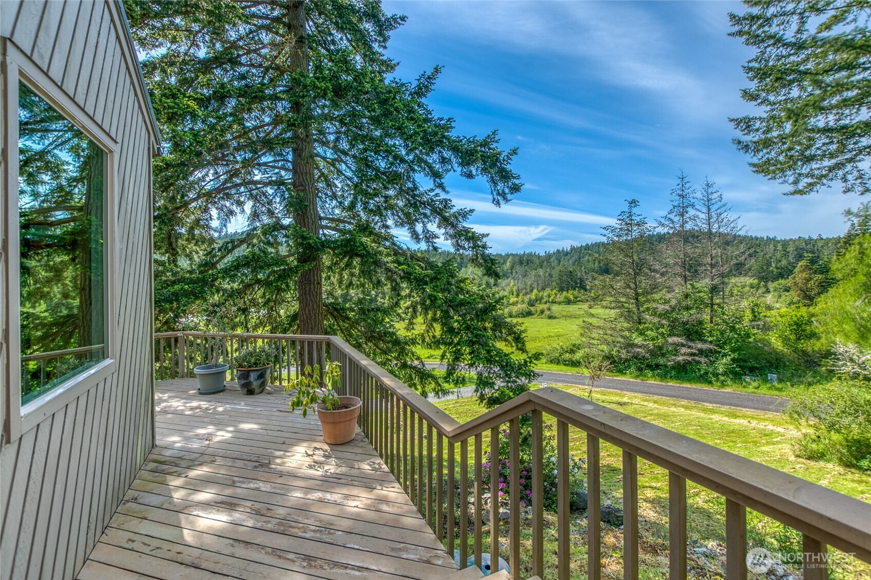 402 Cayou Valley Road Orcas Island, WA 98245 - Photo 14 of 40 a view of a balcony with wooden floor