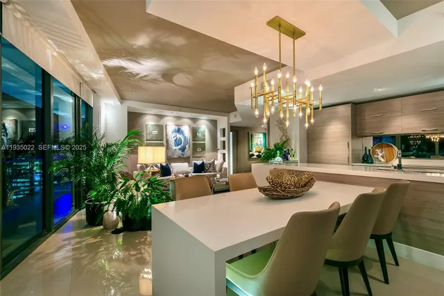 a bathroom with a sink vanity mirror and toilet