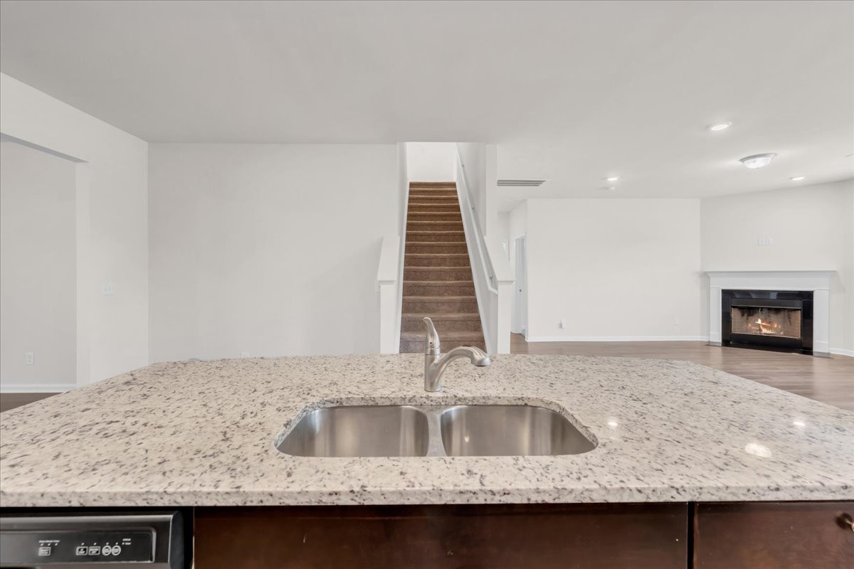 1846 Radnor Road Lebanon, TN 37087 - Photo 18 of 59 a kitchen with granite countertop a sink and a stove