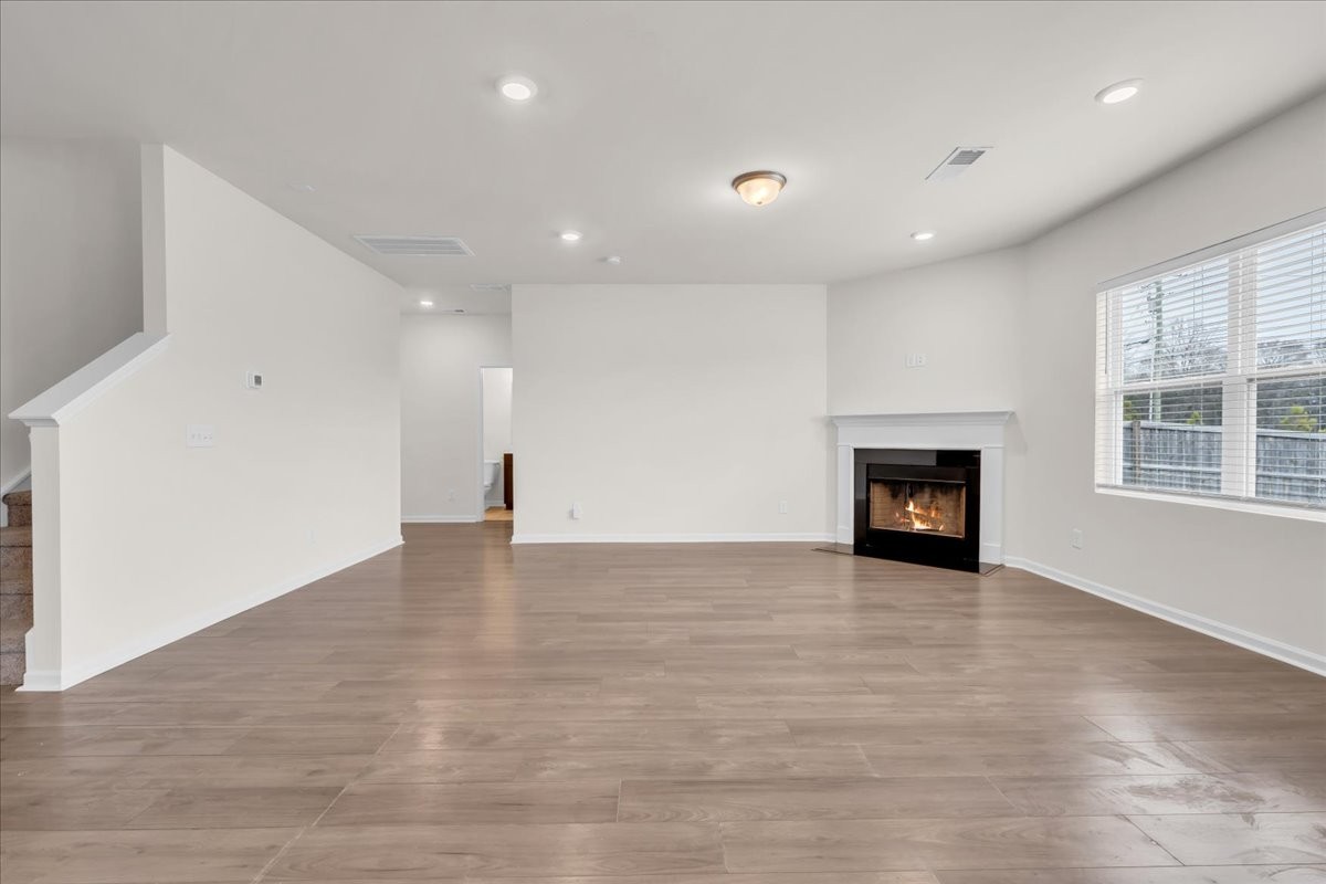 1846 Radnor Road Lebanon, TN 37087 - Photo 21 of 59 a view of an empty room with a fireplace and a window