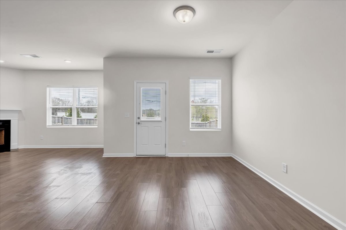 1846 Radnor Road Lebanon, TN 37087 - Photo 22 of 59 an empty room with wooden floor and windows