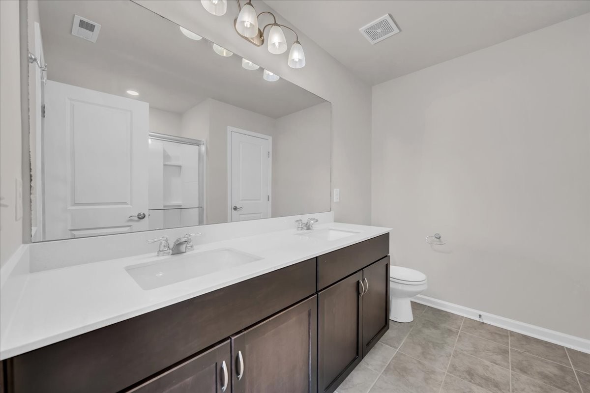 1846 Radnor Road Lebanon, TN 37087 - Photo 39 of 59 a room with a sink vanity and a mirror