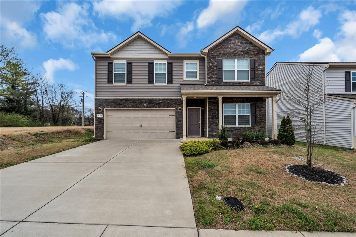 1846 Radnor Road Lebanon, TN 37087 - Photo 6 of 59 a front view of a house with garden